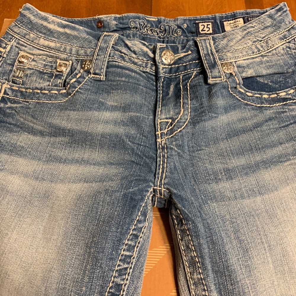 Miss me jeans,  has a nice light wash fade.